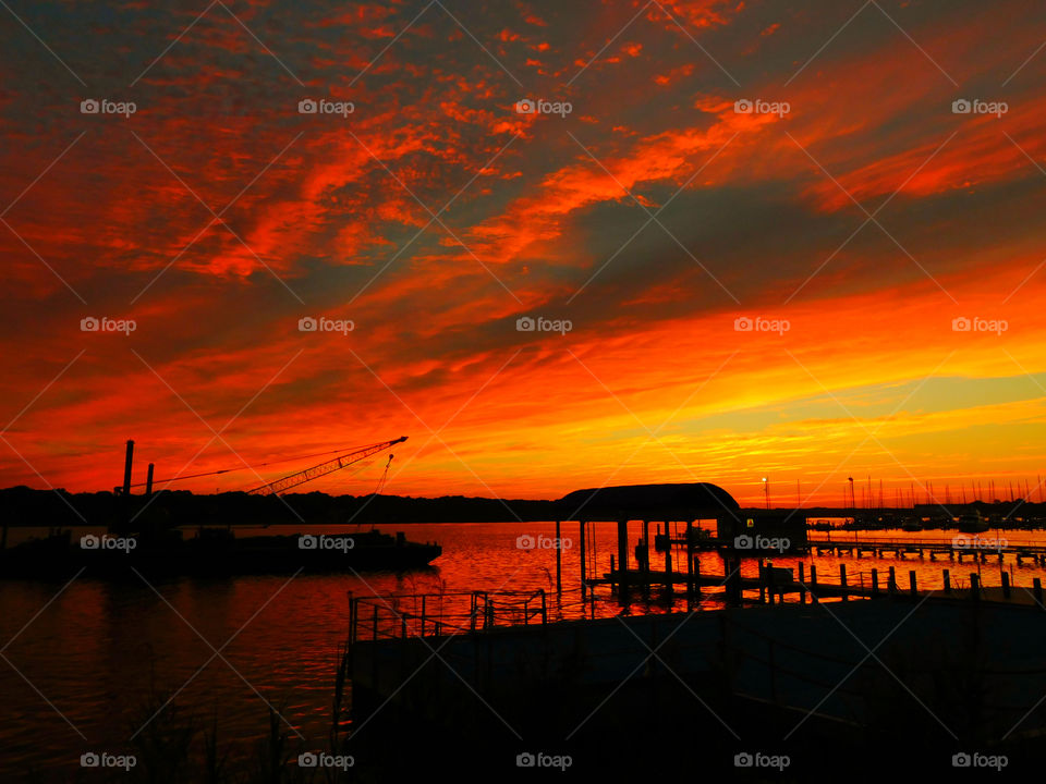 The sky was filled with the most brilliant orange complimented perfectly with hues of gold, yellow, red and crimson. An orange haze had casted over the water, reflecting off every wave. Finally,the sun disappears along with the shine. I can only wait to see another magical moment of beauty and warmth! I can only wait for another sunset! Enjoy!