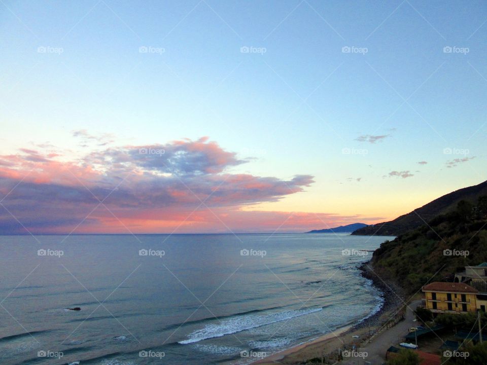 Sea water at sunrise at Cape D'Arena ( Palinuro - Italy ).