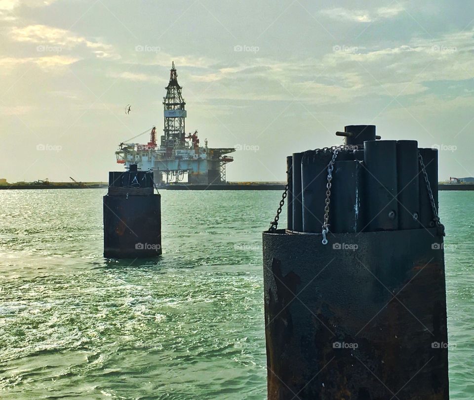 Oil rig in the Texas coast in Port Aransas. View from the ferry. 