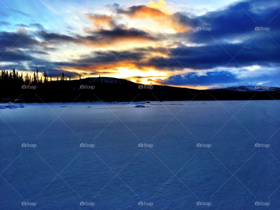 Sunset in snowy landscape 