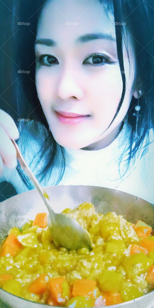 Eating a healthy food which is Korean Curry that i personally made with love in South Korea.