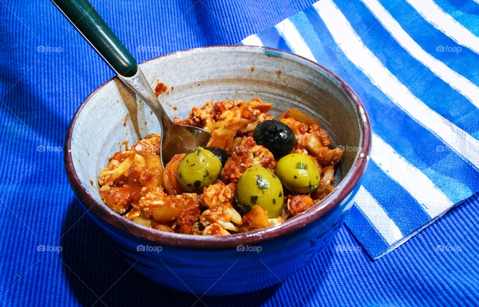 Cauliflower with olives and tomatoes