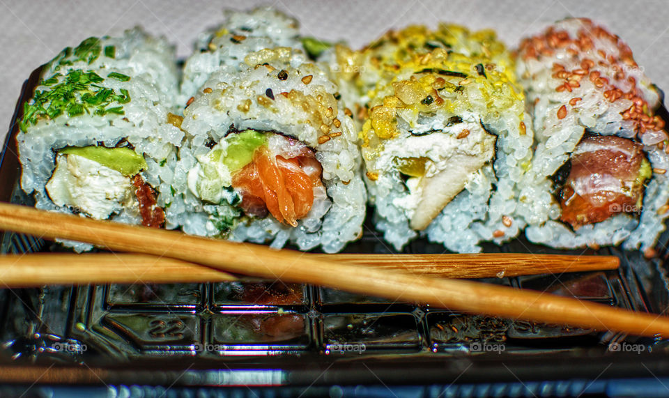 Close up view of sushi rolls on a plate