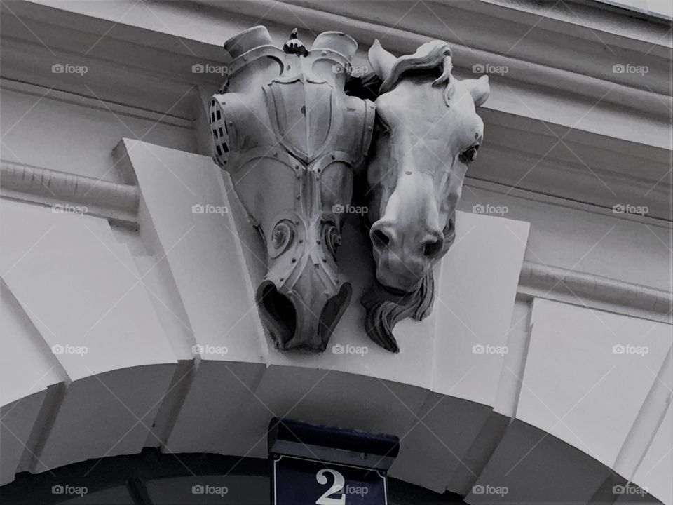 Horse head ornament on a building in Austria.
