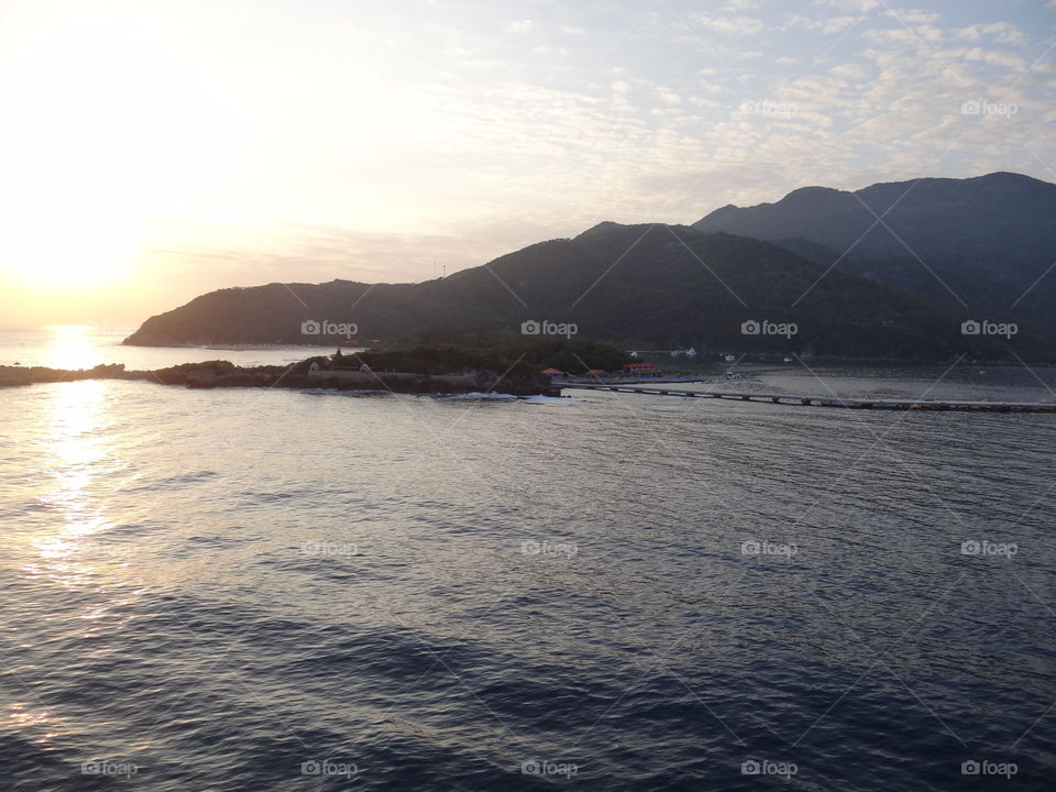 Wake Up Upon Arrival. The view from the balcony as the ship is about to dock in Haiti just at sunrise. 