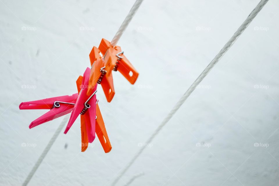 Colorful clothes nails on a clothesline