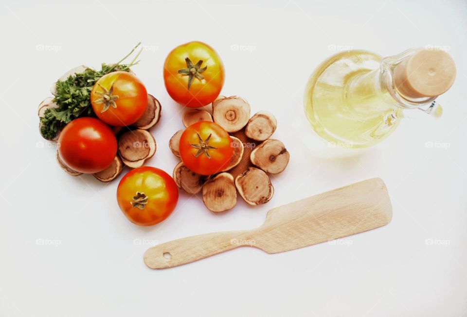 Fresh tomatoes and oil