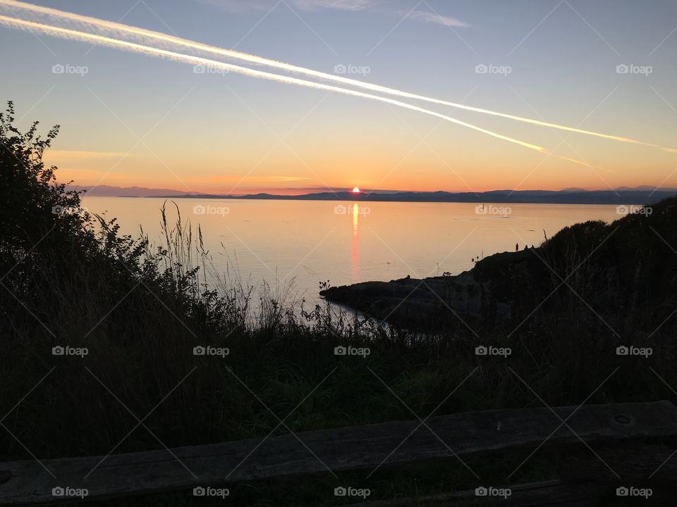 Scenic view of lake during sunset