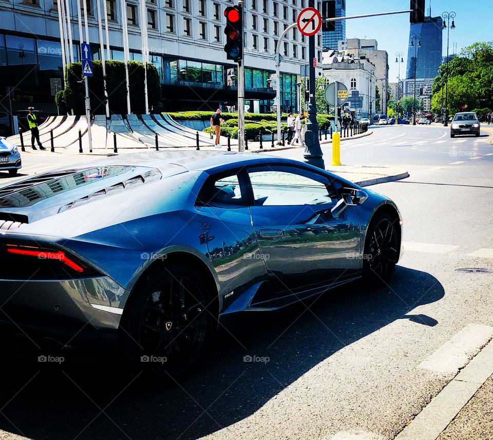 Lamborghini waiting for red traffic light 