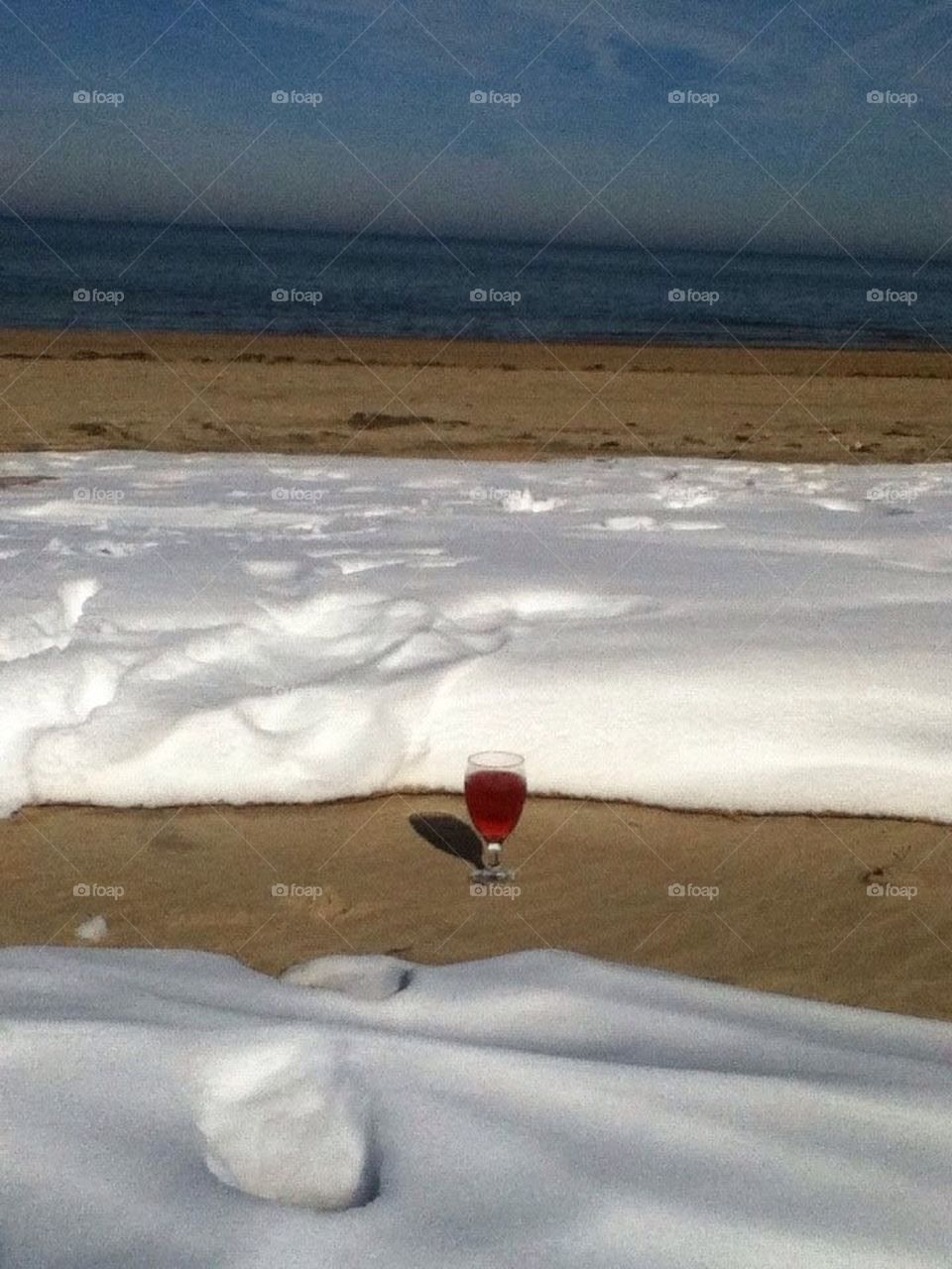 Chilled wine on snowy beach