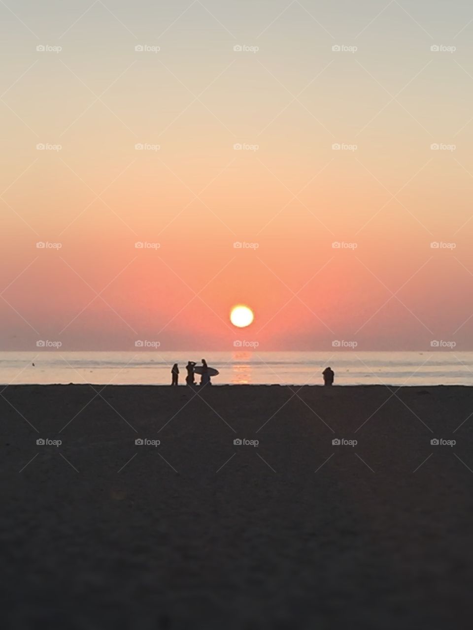 Until Tomorrow . Beach goers at Morro Bay in California finishing a successful day at the beach
