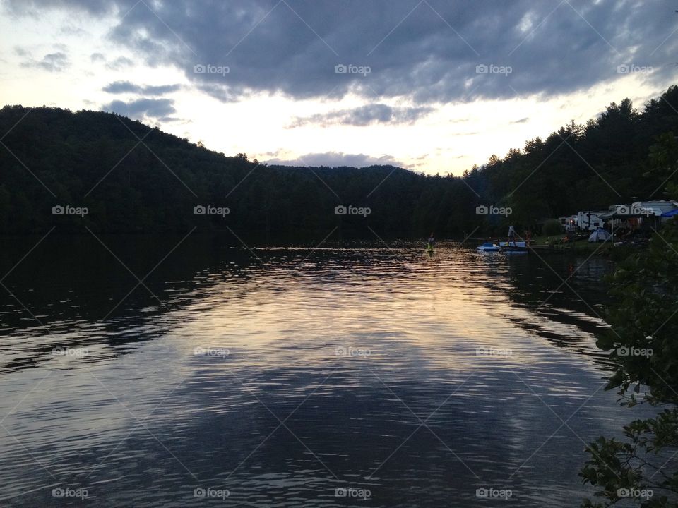 Evening at the lake. Watching the sun set