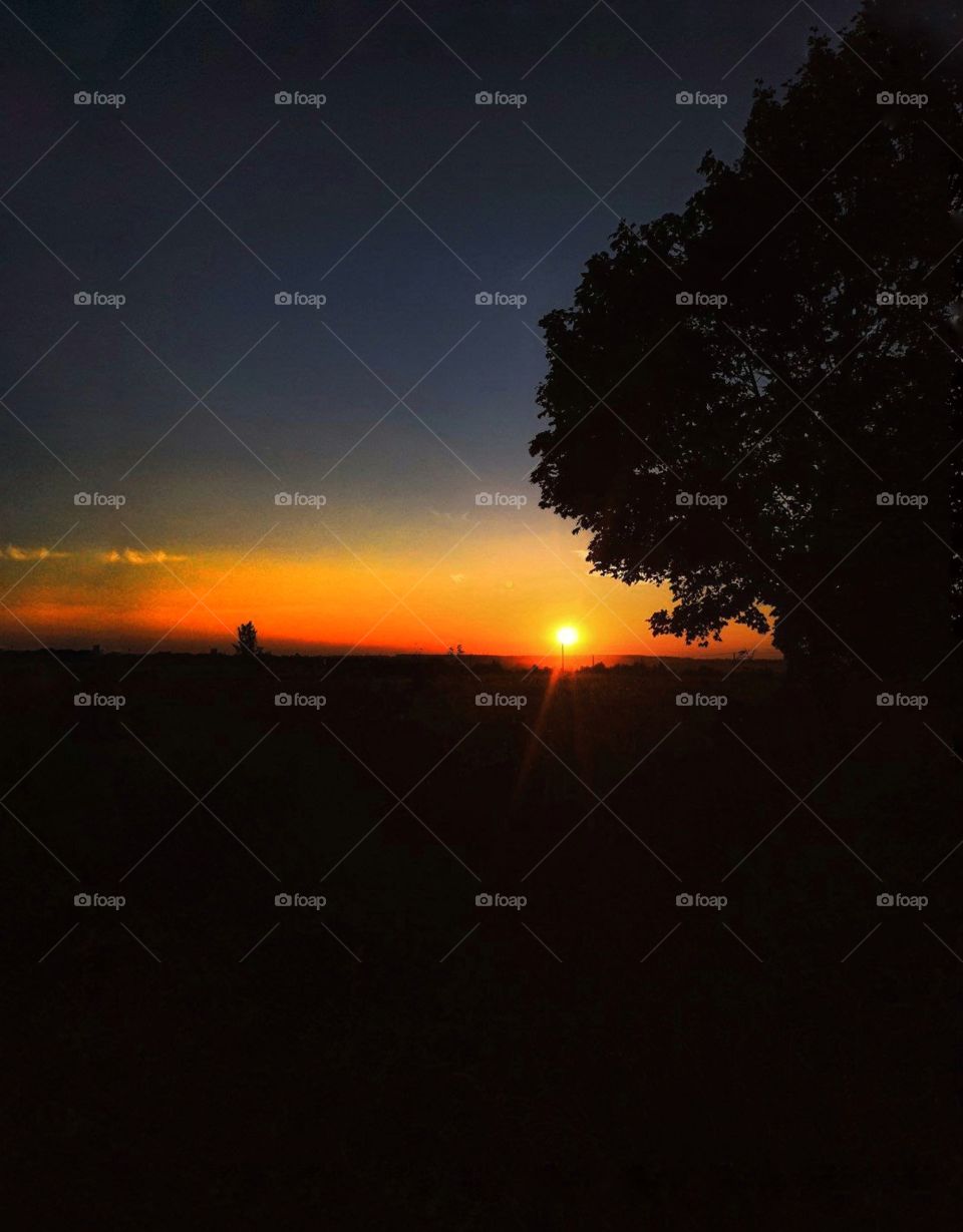 In this photo I capture suntet. The awesome beauty of the setting sun is also symbolic of the beauty and mystery of life itself.