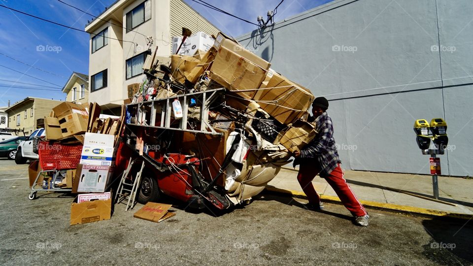 An interesting man with a lot of boxes. And a red truck... which you can’t really notice... those damn boxes 