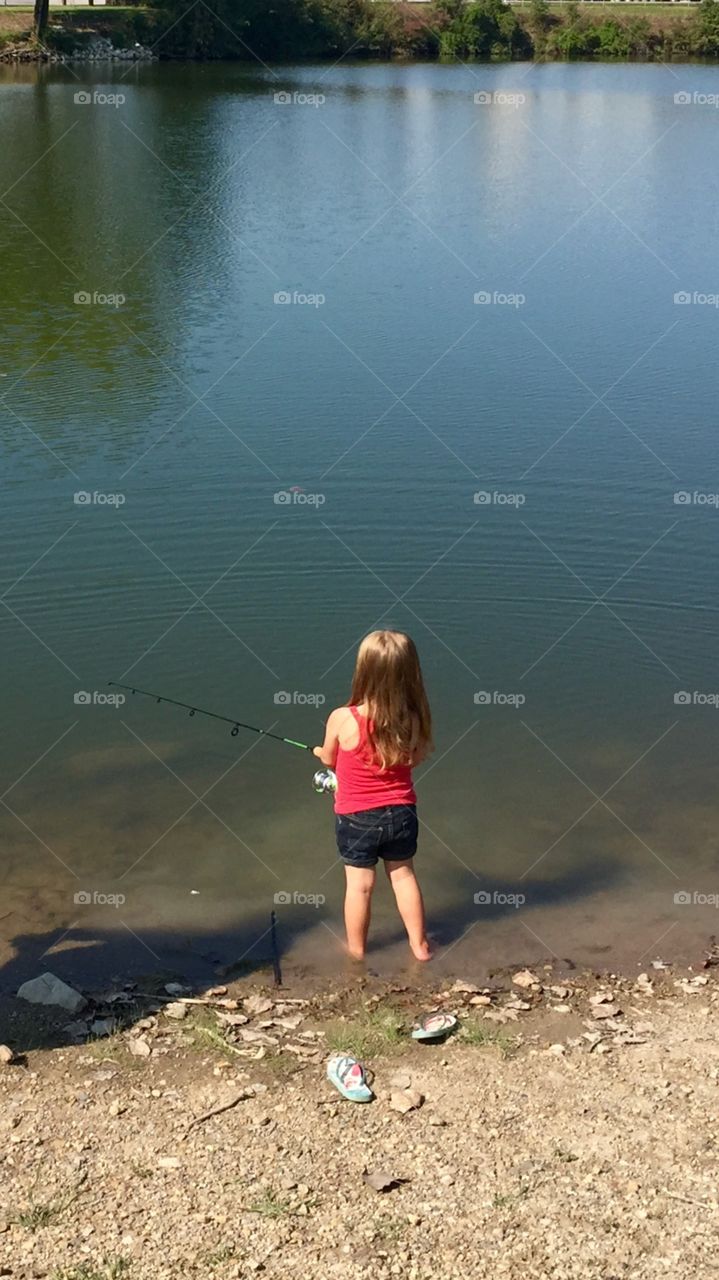 First time fisherman. First time fishing for our little girl. She really got into it. 