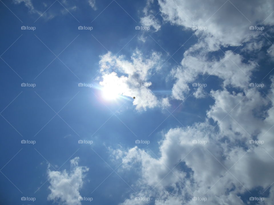 up up and away. this yellow balloon got away from this child
