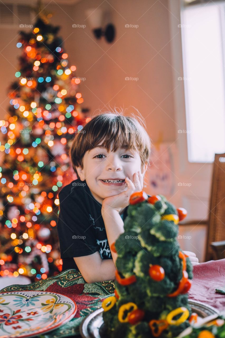 Little boy at Christmas table