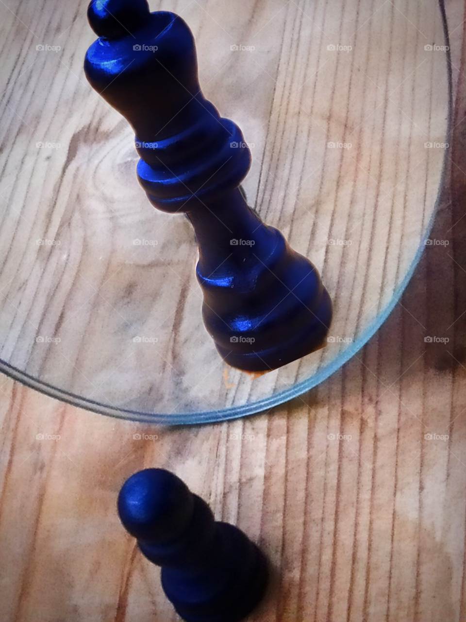 Chess.  The pawn sees herself in the mirror that she is a queen