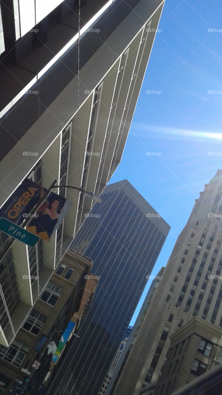 Pine Street in San Francisco. Buildings as high as the sky.