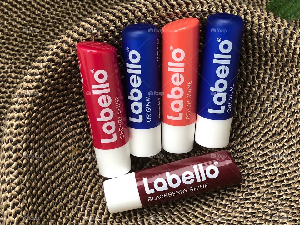 Glossy Labello tinted lip balms.