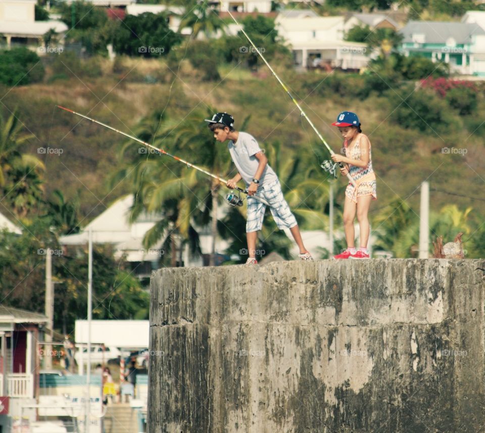 Kids learning fishing 