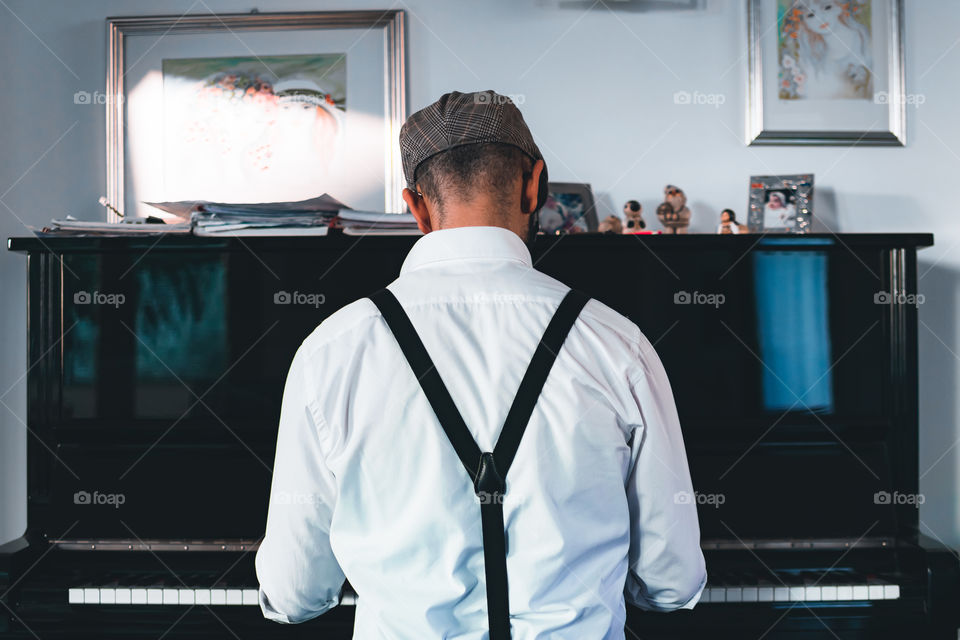 Man playing a piano 