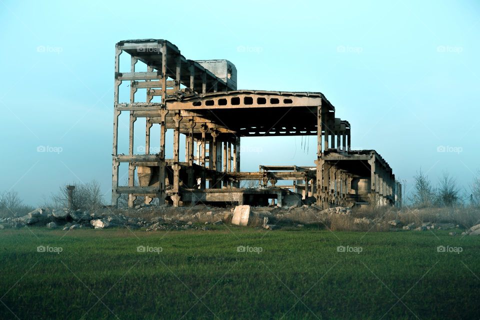 destroyed and abandoned building in the fog