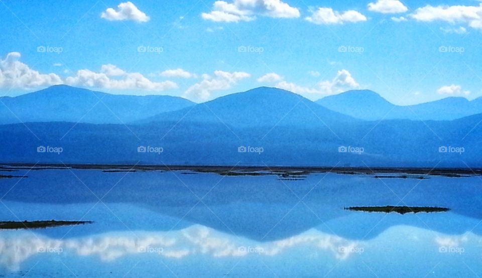 Reflection of the  mountain and clouds in the water, reflection,Mountain,clouds,water, reflecting,blue,landscape,nature,colorful,sunset,double