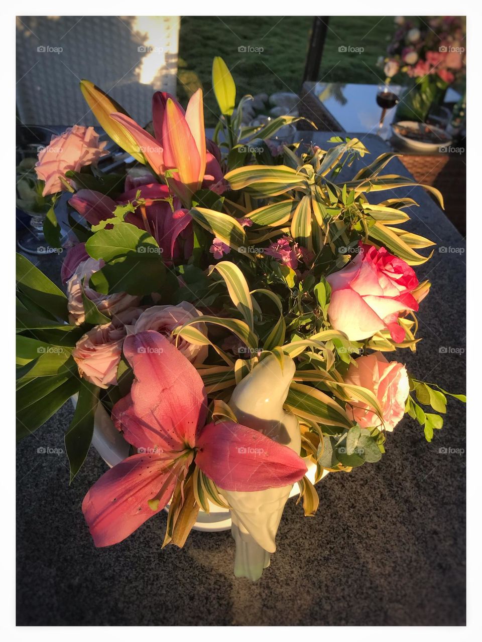 vase with flower arrangement for a wedding ceremony