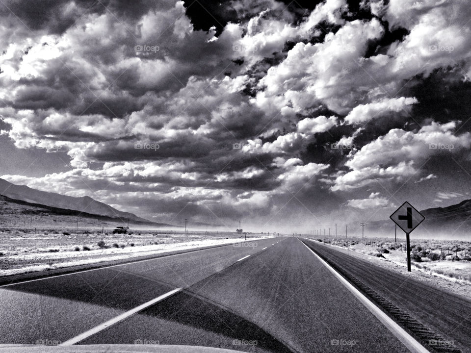road puffy clouds dust storm black and white center line distance dust storm owen valley owens valley by pixel