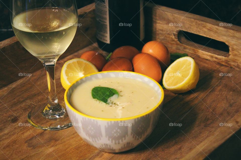 Dinner is served.  Avgolemono paired with a nice glass of bubbly Prosecco.