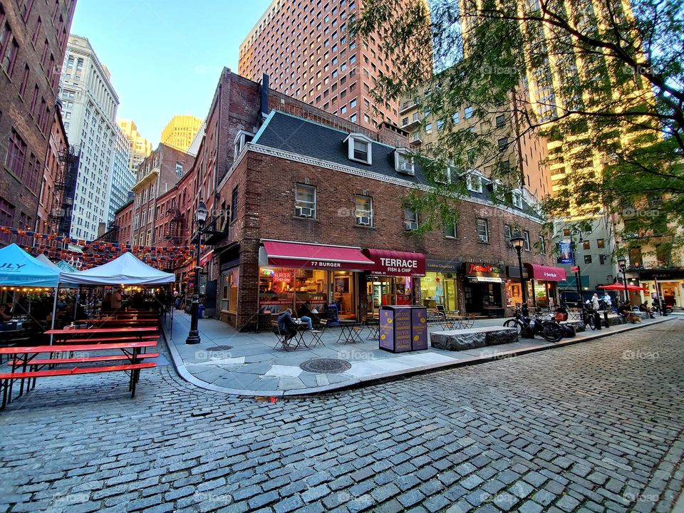 A row of businesses located in an older section of New York City