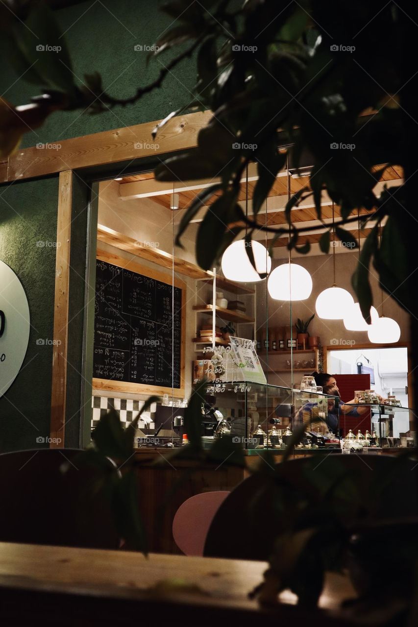 Ice cream shop window, evening lights