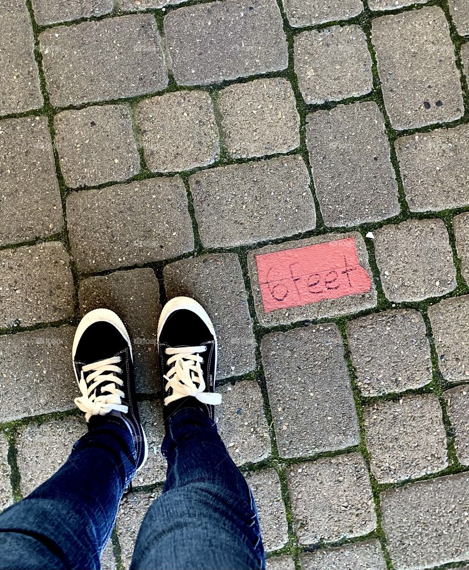 Stay 6 feet away - social distancing- shopping during the pandemic 