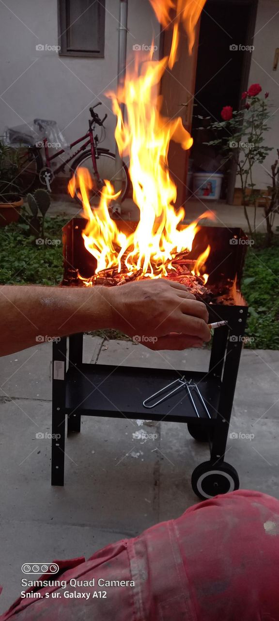 making a barbecue in the backyard