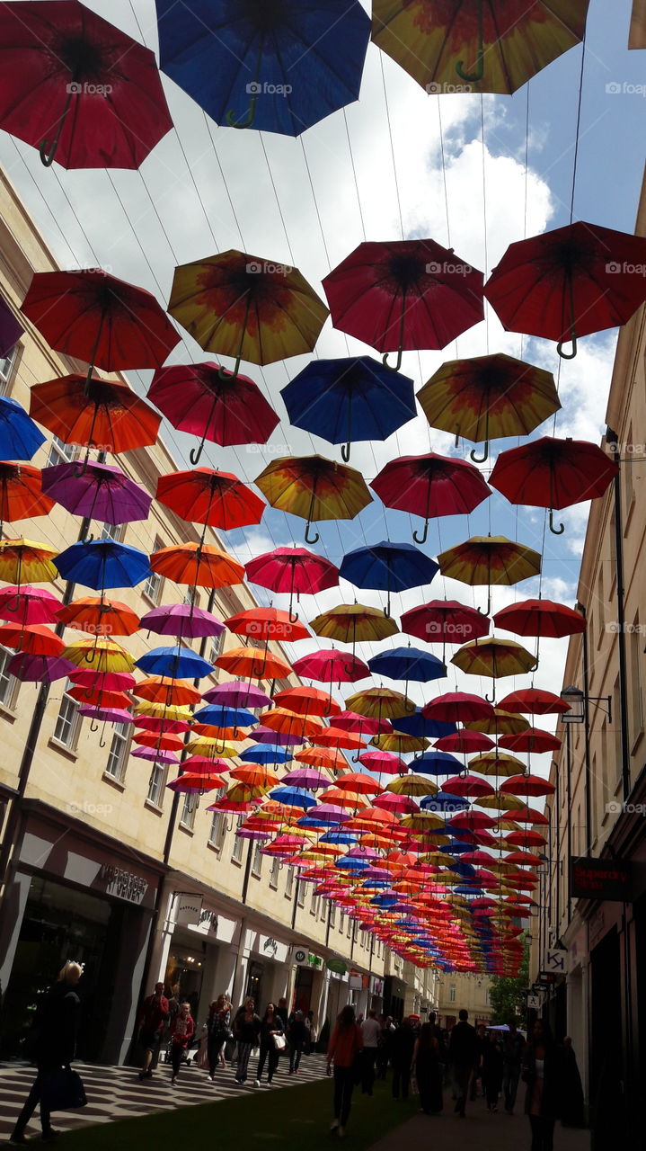 umbrellas hanging up at shopping centre in bath