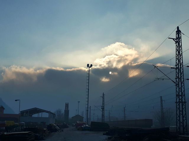 fog on the hill hides the sun and everything looks like an eclipse