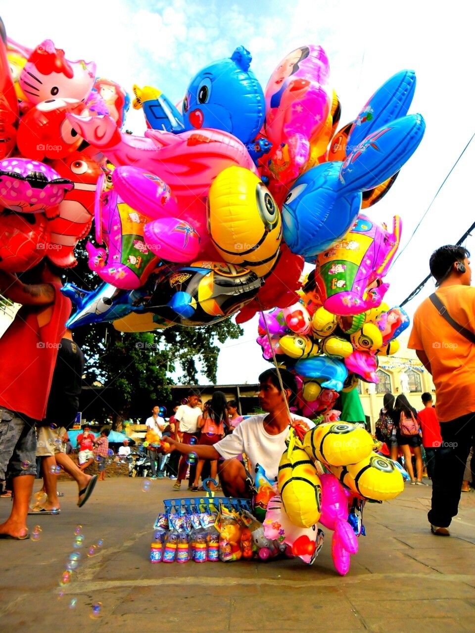 Balloon vendor at a city park in antipolo, rizal, philippines