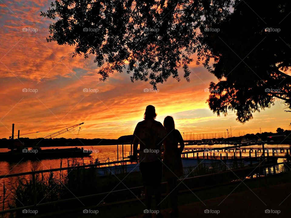 The horizon erupted in spectacular golden hues of orange moments before the sun sunk below the horizon giving the viewers a fabulous and unforgettable sunset.