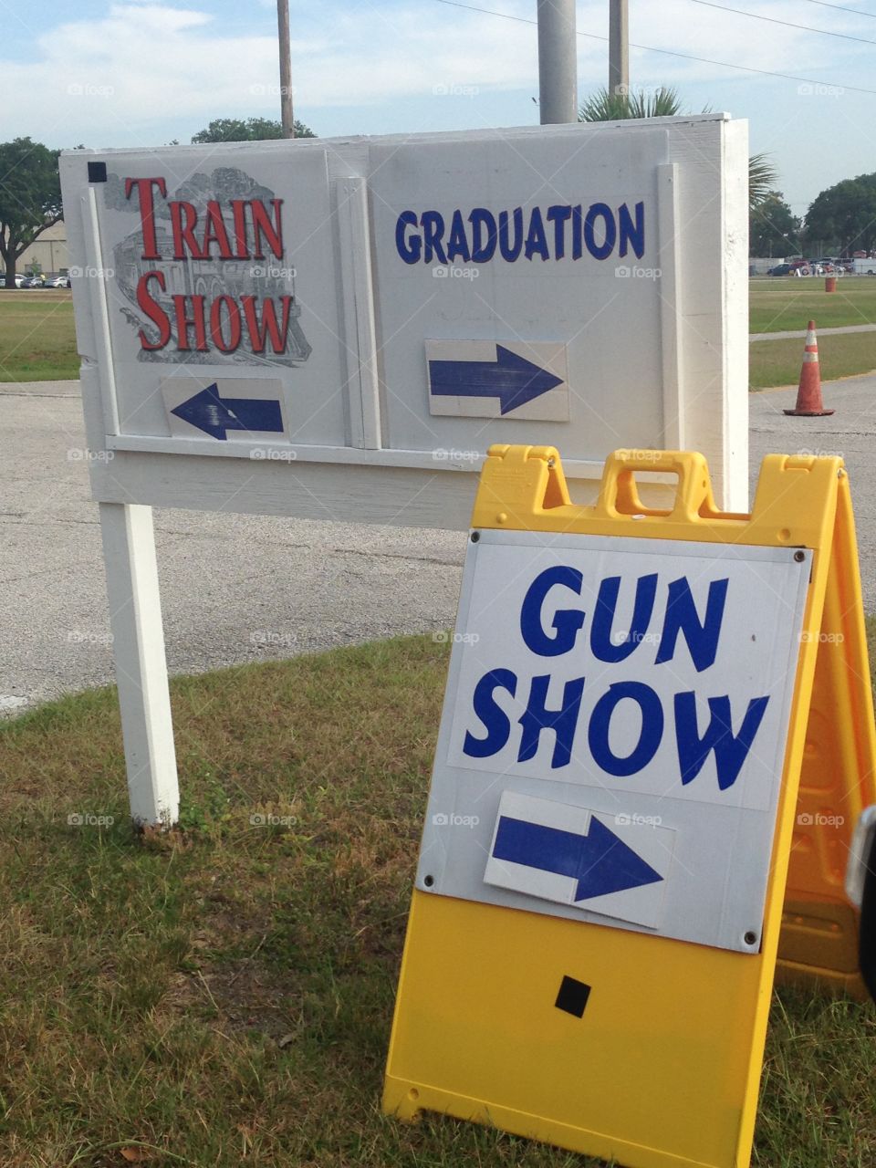 Gun show graduation train show signs