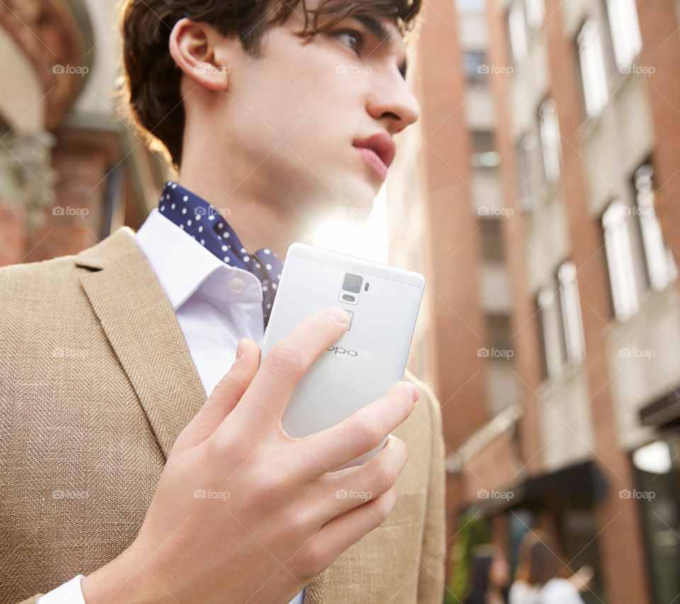 Boy with sell phone.