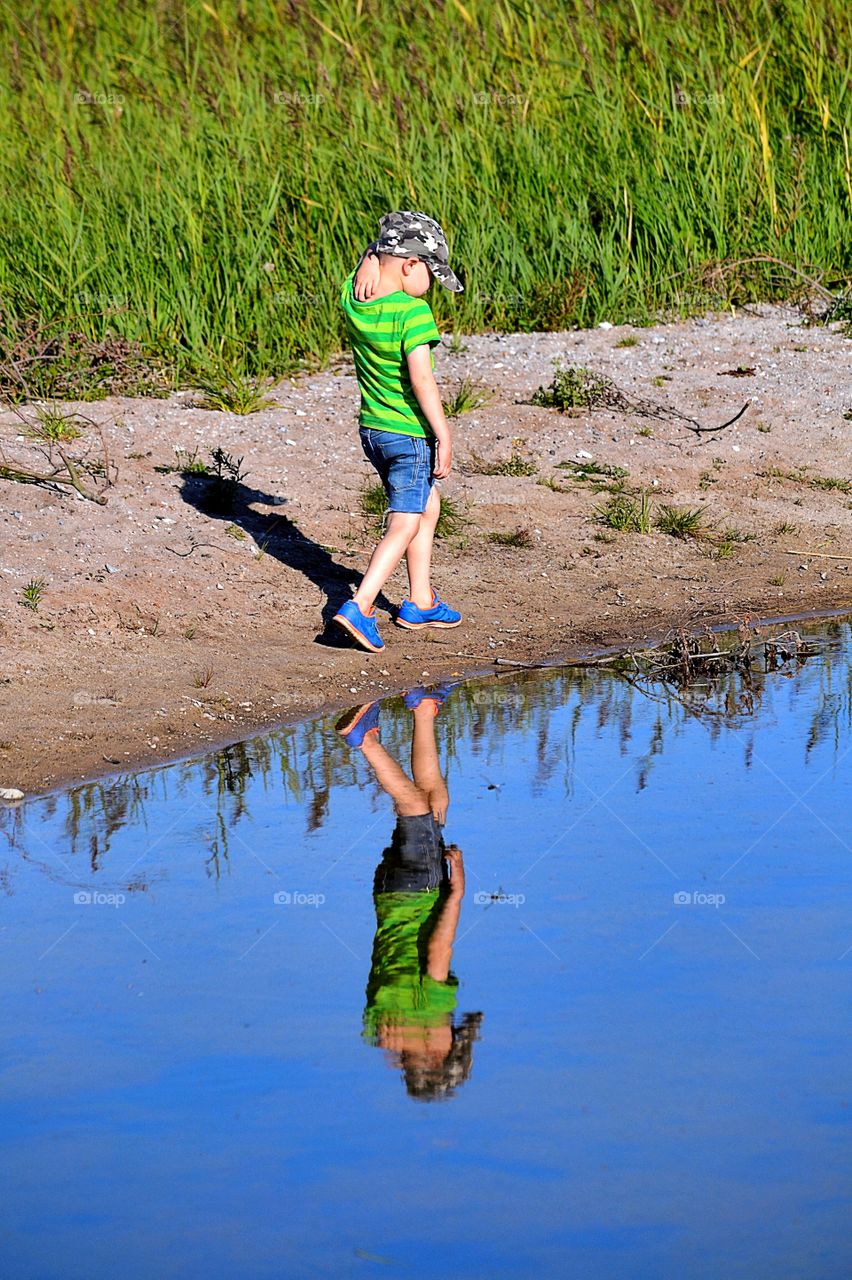 Boy at the pond