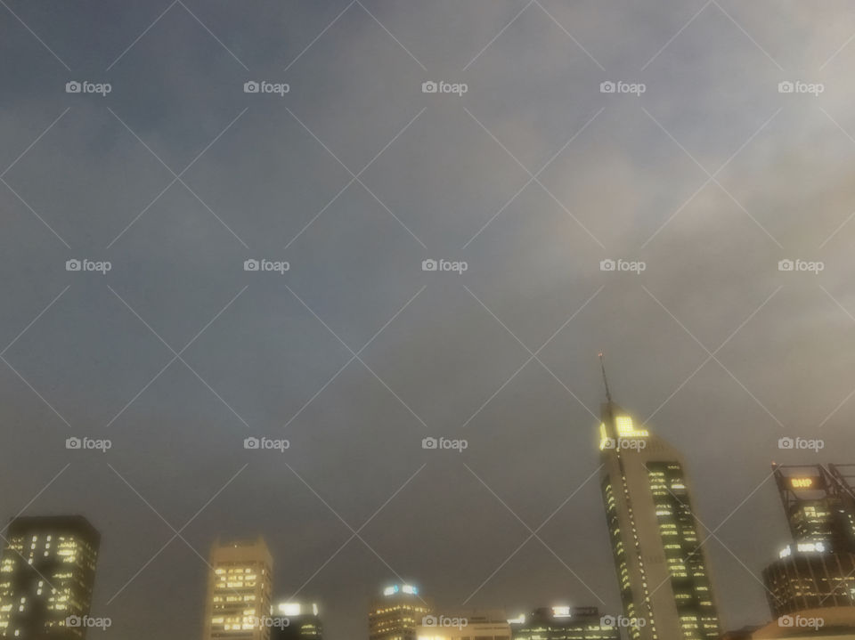 Soft focus image of skyscrapers in Perth, Western Australia after the time of dusk.
