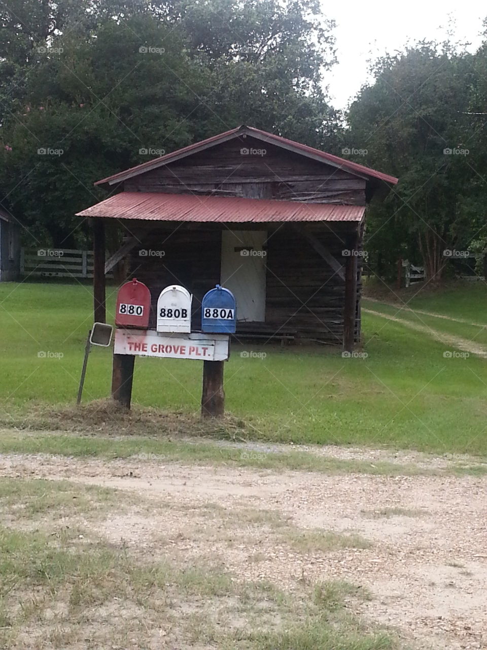 Old rural home. I saw this old home with the red, white and blue mailboxes in my way home from north Louisiana.