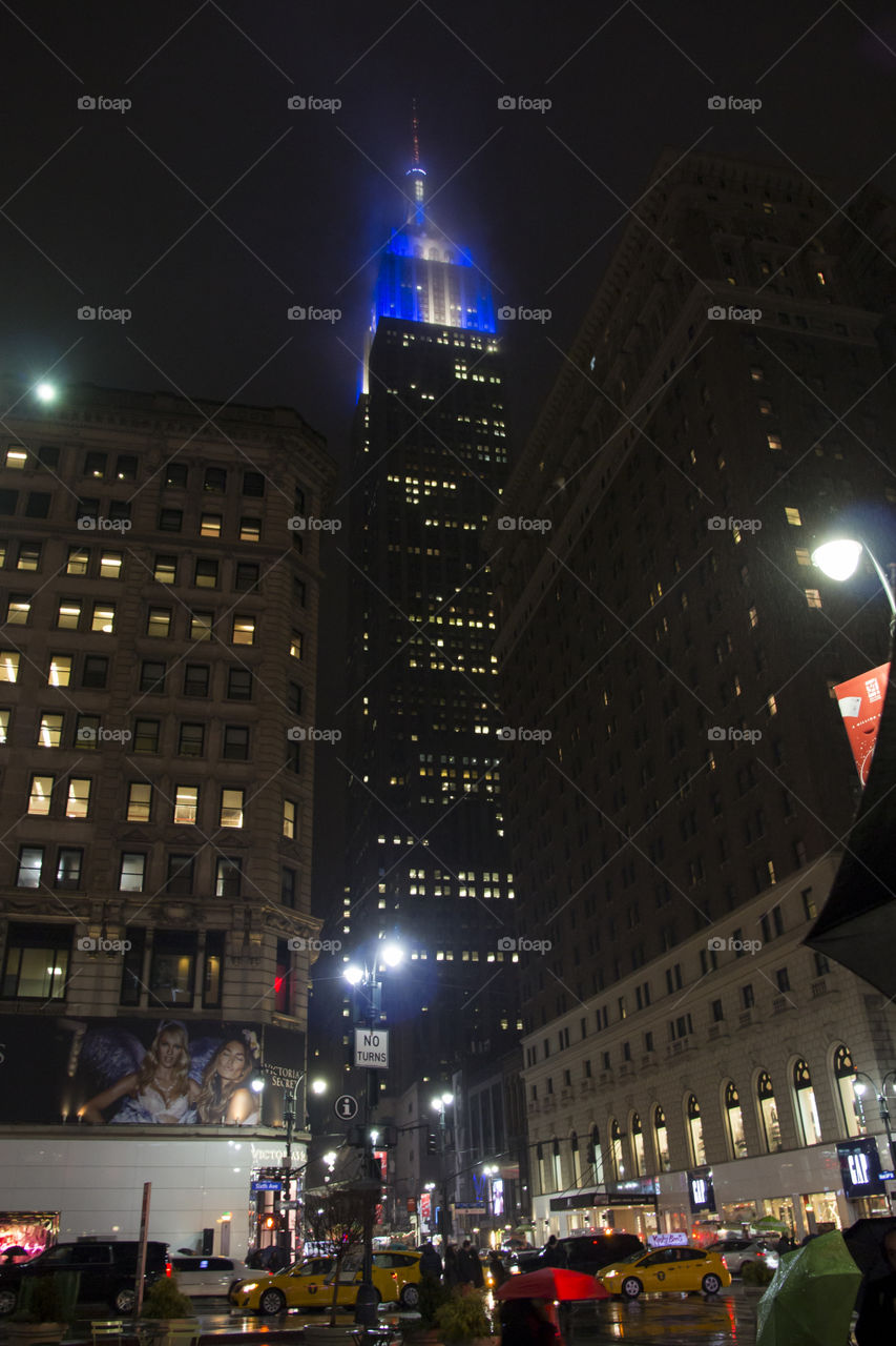 New York City - skyscraper shining in blue at night
