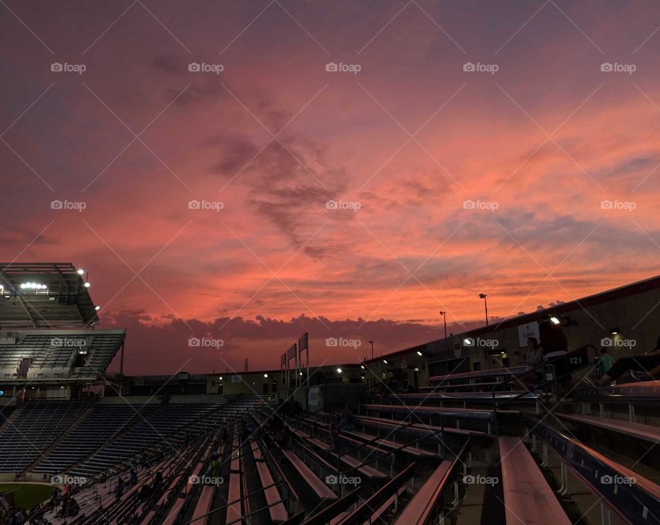 firey sunset at quiet stadium