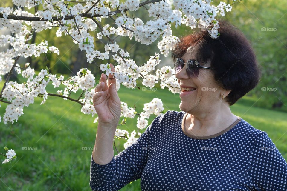 woman smiling spring blooming time