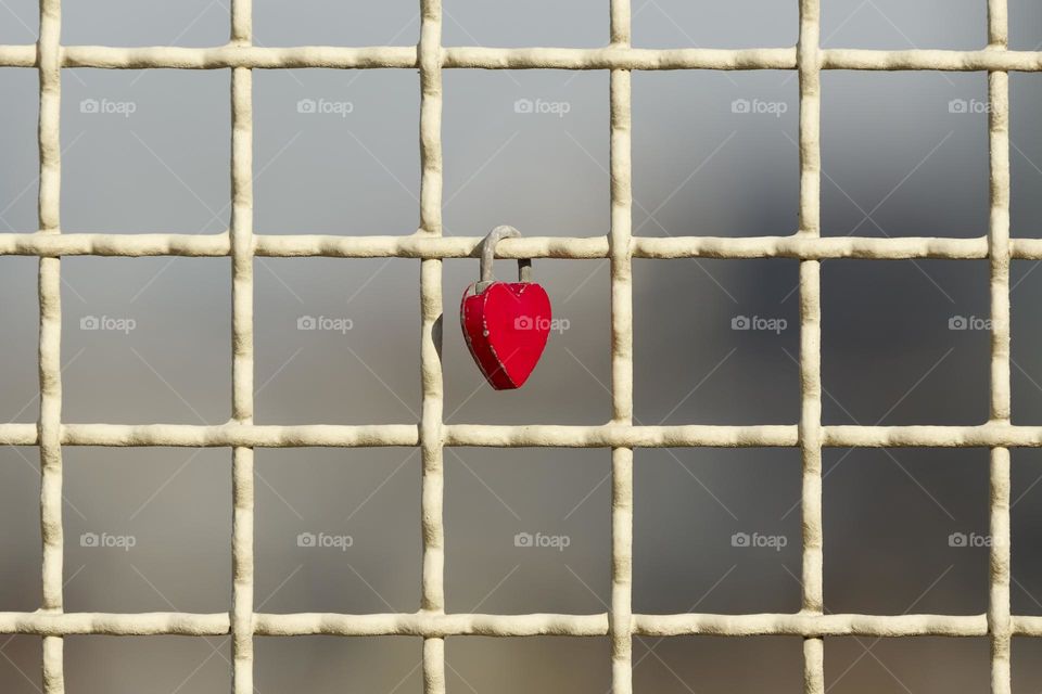 heart lock on a fence