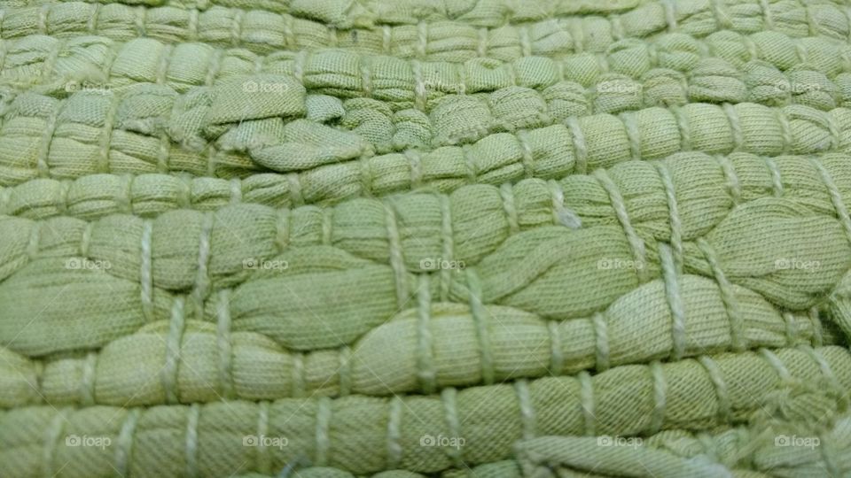 green rug close up
