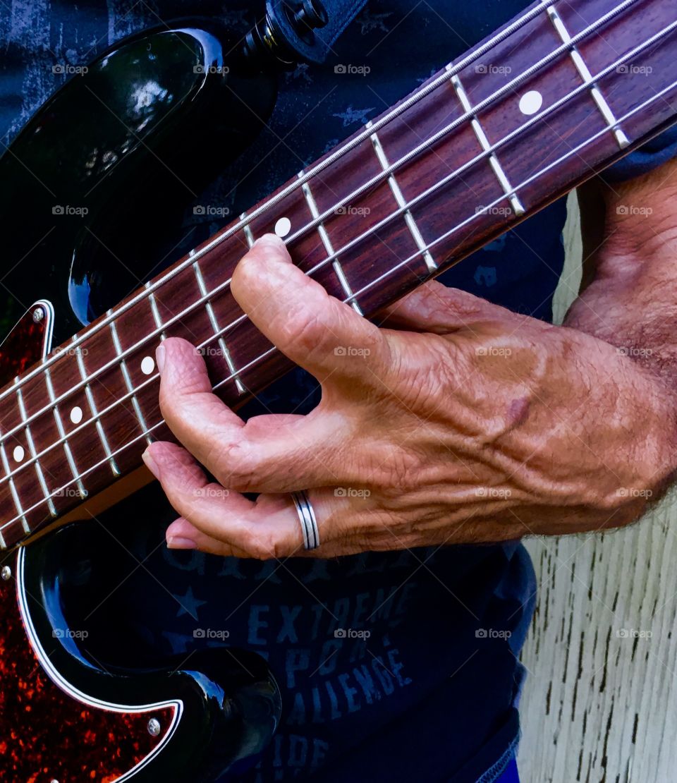 Bass guitar hand 